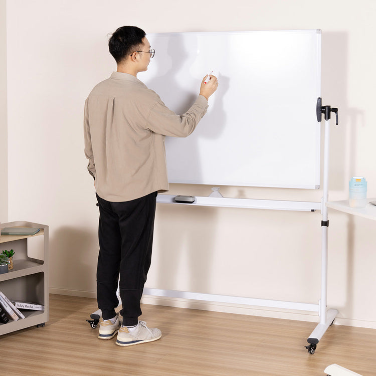 Man writing on whiteboard