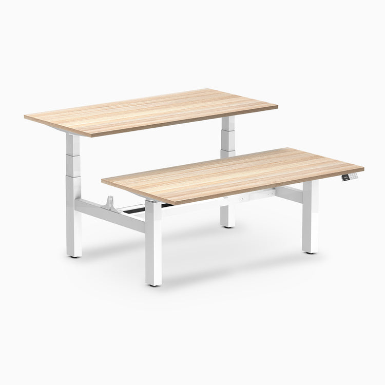 back to back sit stand workstation classic oak desk top white legs
