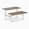 back to back sit stand workstation natural walnut desk top white legs
