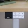 Desky blue smart controller in white variation on desk